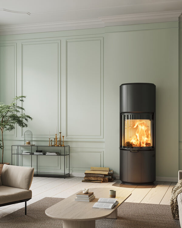 Scan 87 wood burning stove in a living room setting with the stove lit