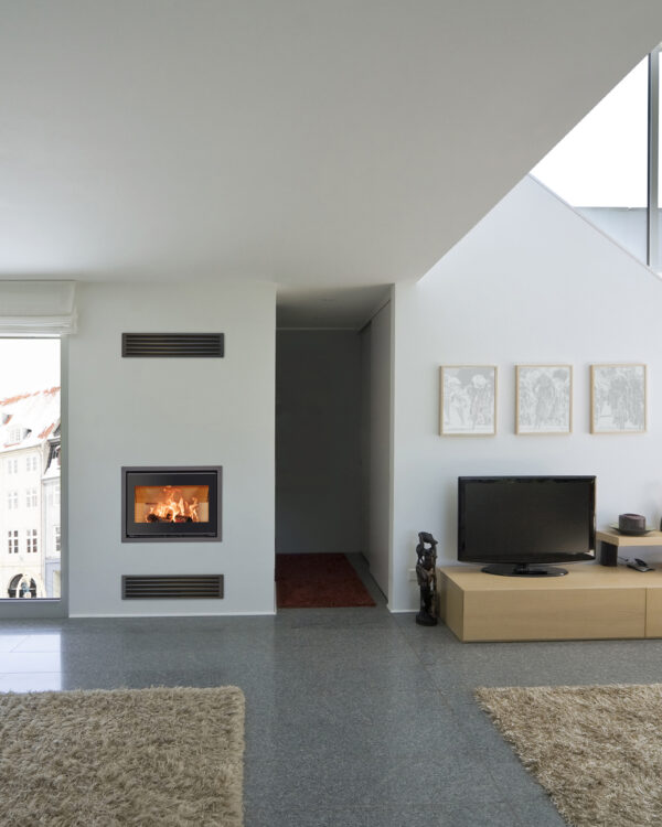 Scan 1005 wood burning stove in a living room setting