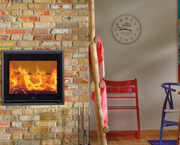 Scan 1003 Insert stove in a living room with the stove lit