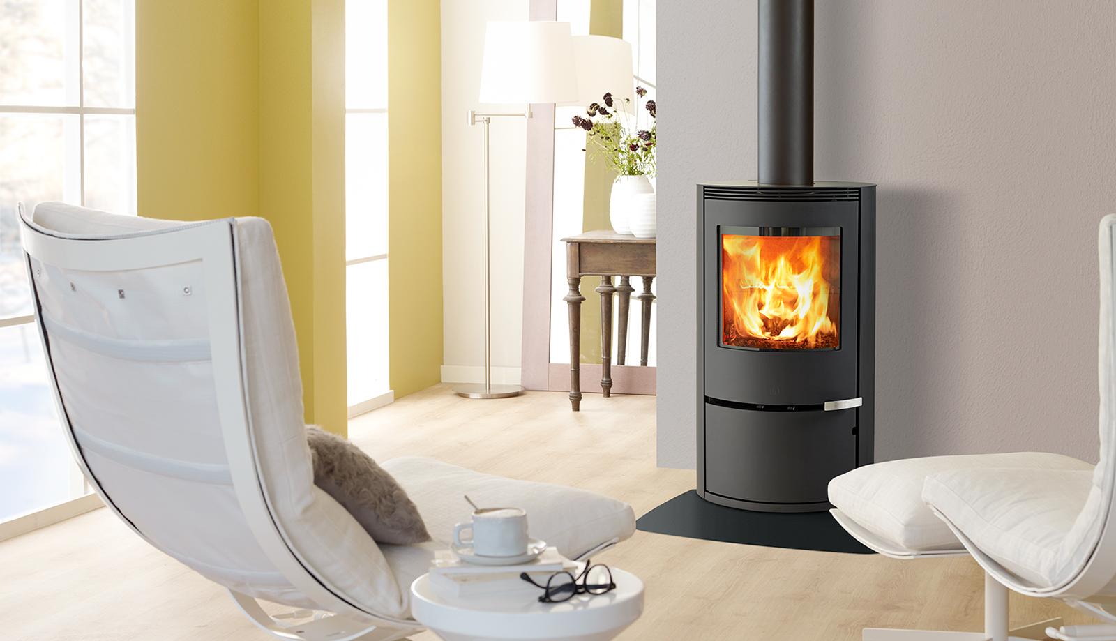 ILD 9 Eco Wood Burning Stove by Jøtul Group, living room setting